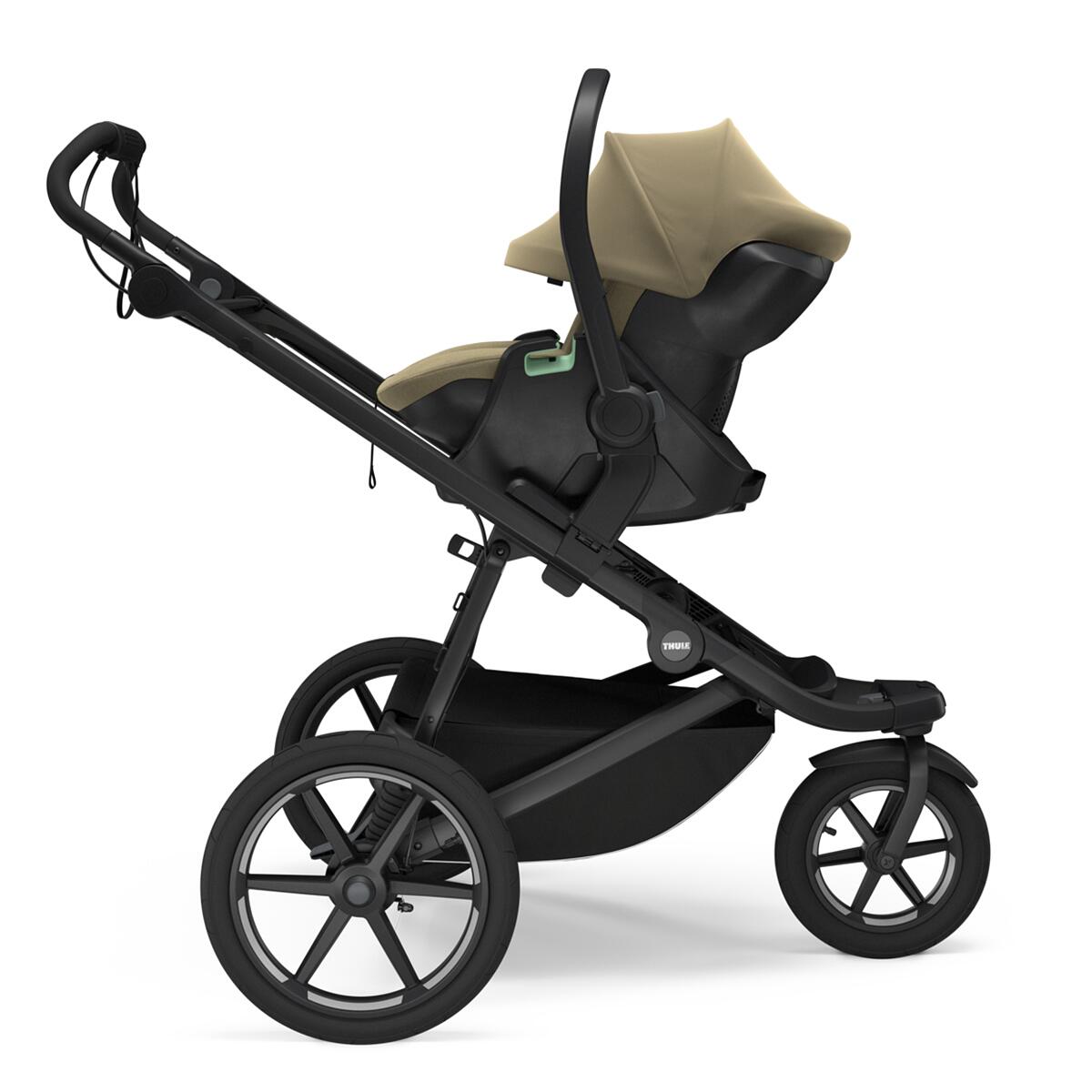 Carucior Thule Urban Glide 3 all-terrain cu prinderea hamului magnetica Tint Taupe