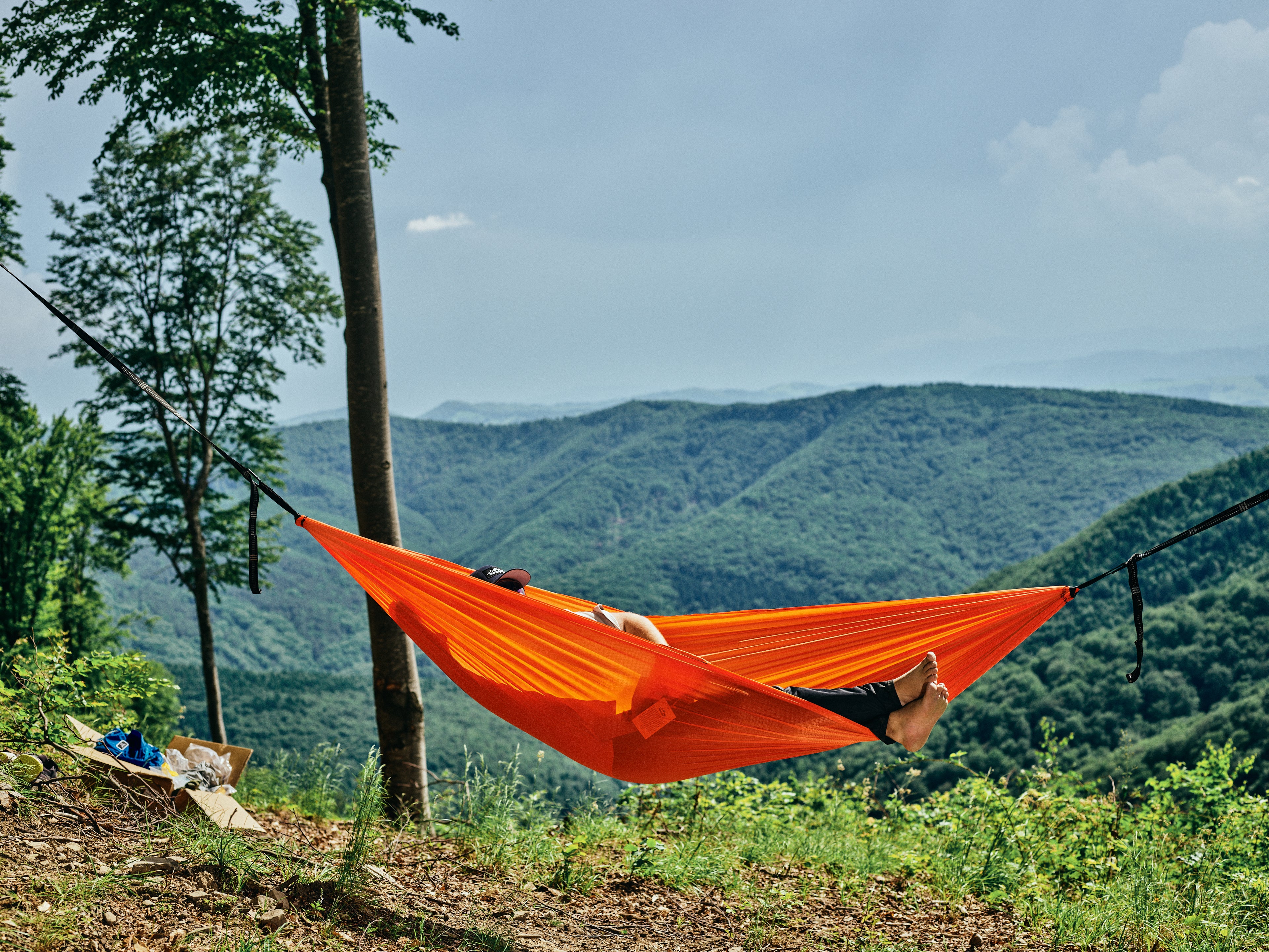Hamac hikerjoy PRO portocaliu ușor de transportat în drumeții lungi