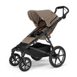 Carucior Thule Urban Glide 4 all-terrain cu catarama hamului magnetica Maro